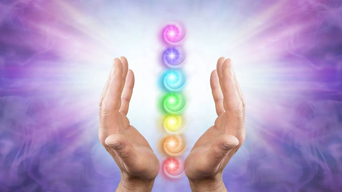 A person wearing a colorful 7 chakra bracelet, symbolizing balance and energy healing benefits.