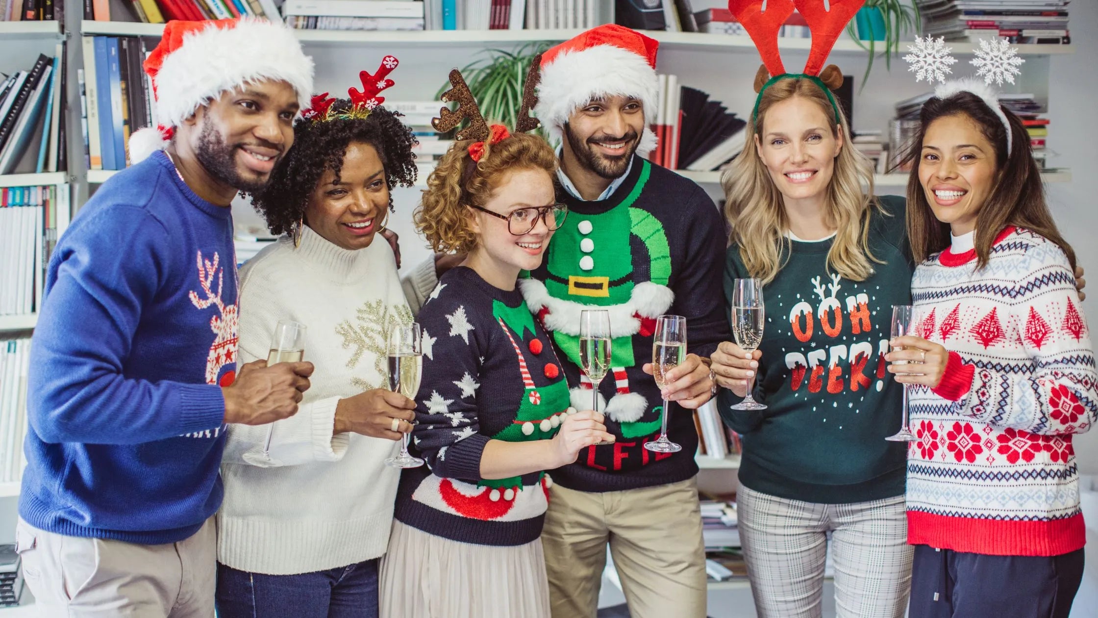 A variety of thoughtful Secret Santa gift ideas displayed on a festive table, including mugs and cozy socks.