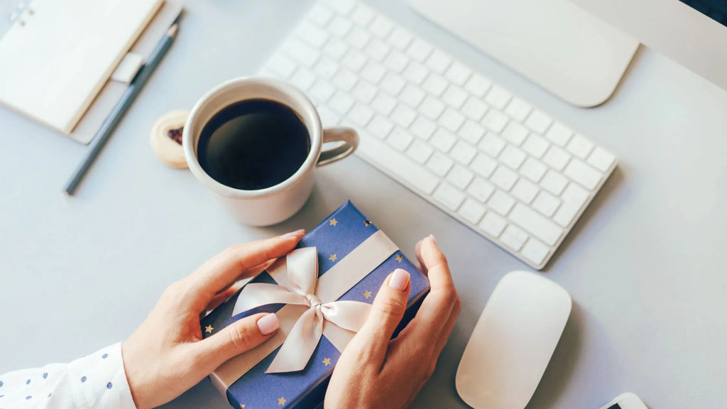 A variety of thoughtful Valentine’s Day gifts for coworkers, including mugs, chocolates, and personalized items.